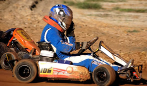 Dirt kart racing sponsored by Moorish Transport Services Dirt kart with Moorish Transport Services logo